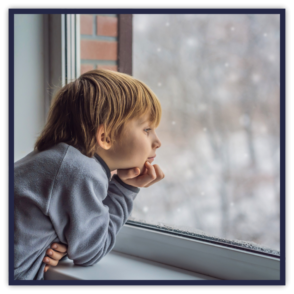 a child looking out of a window